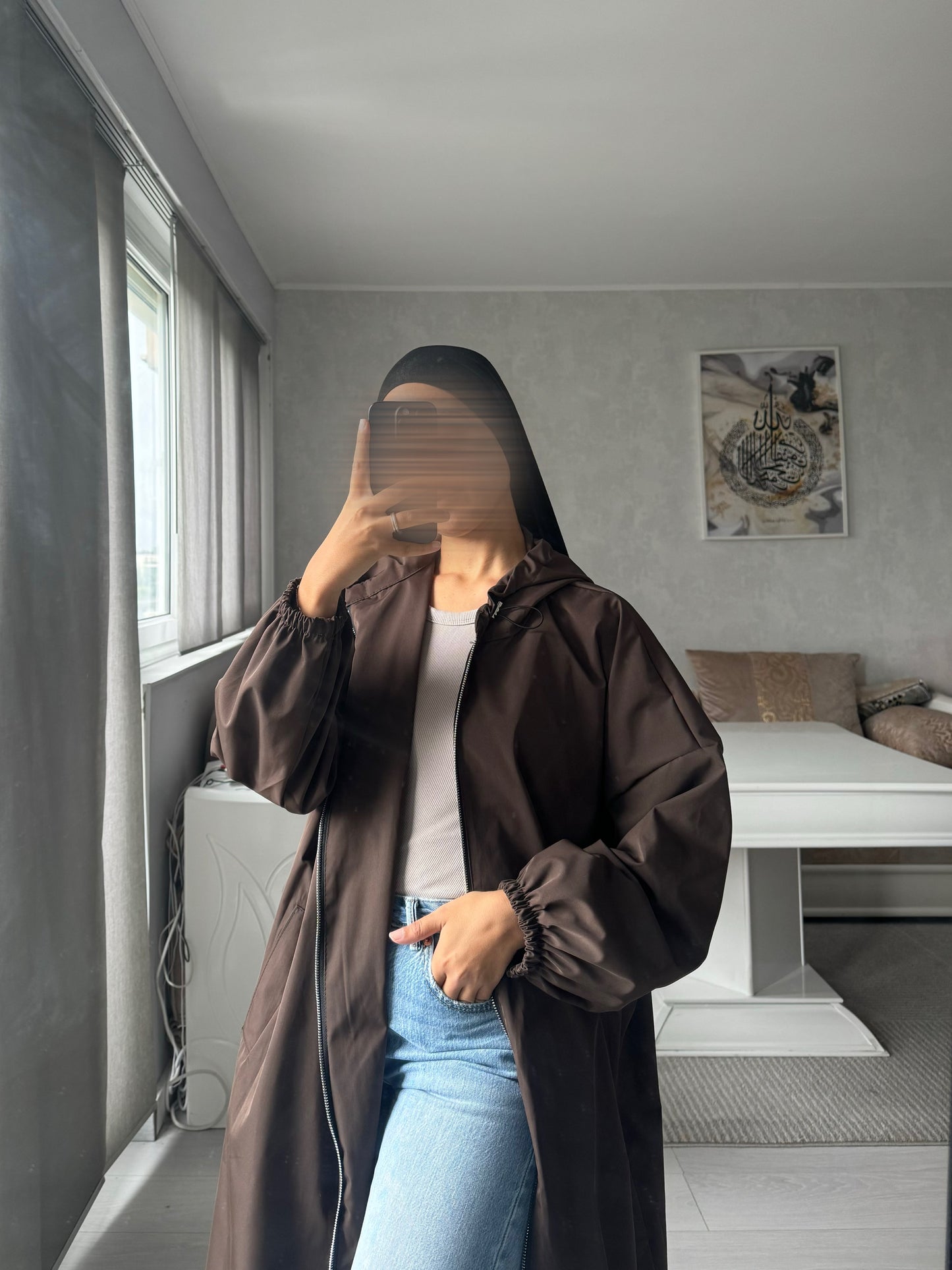 Imperméable à capuche